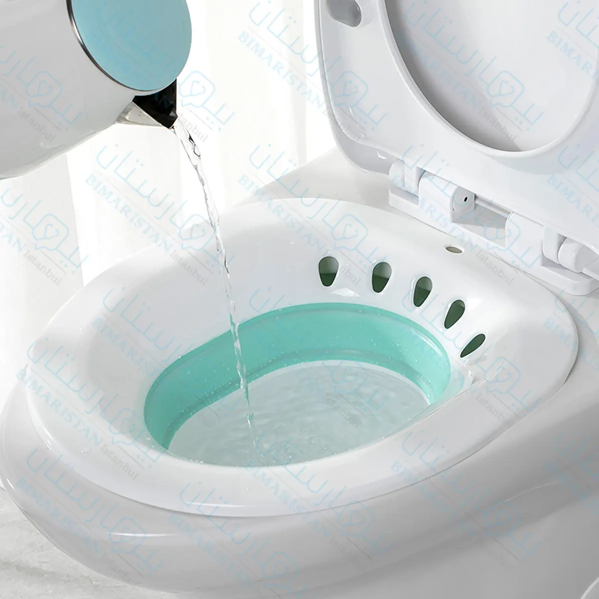 The sitz is placed on the toilet seat and filled with warm water for the patient to sit on