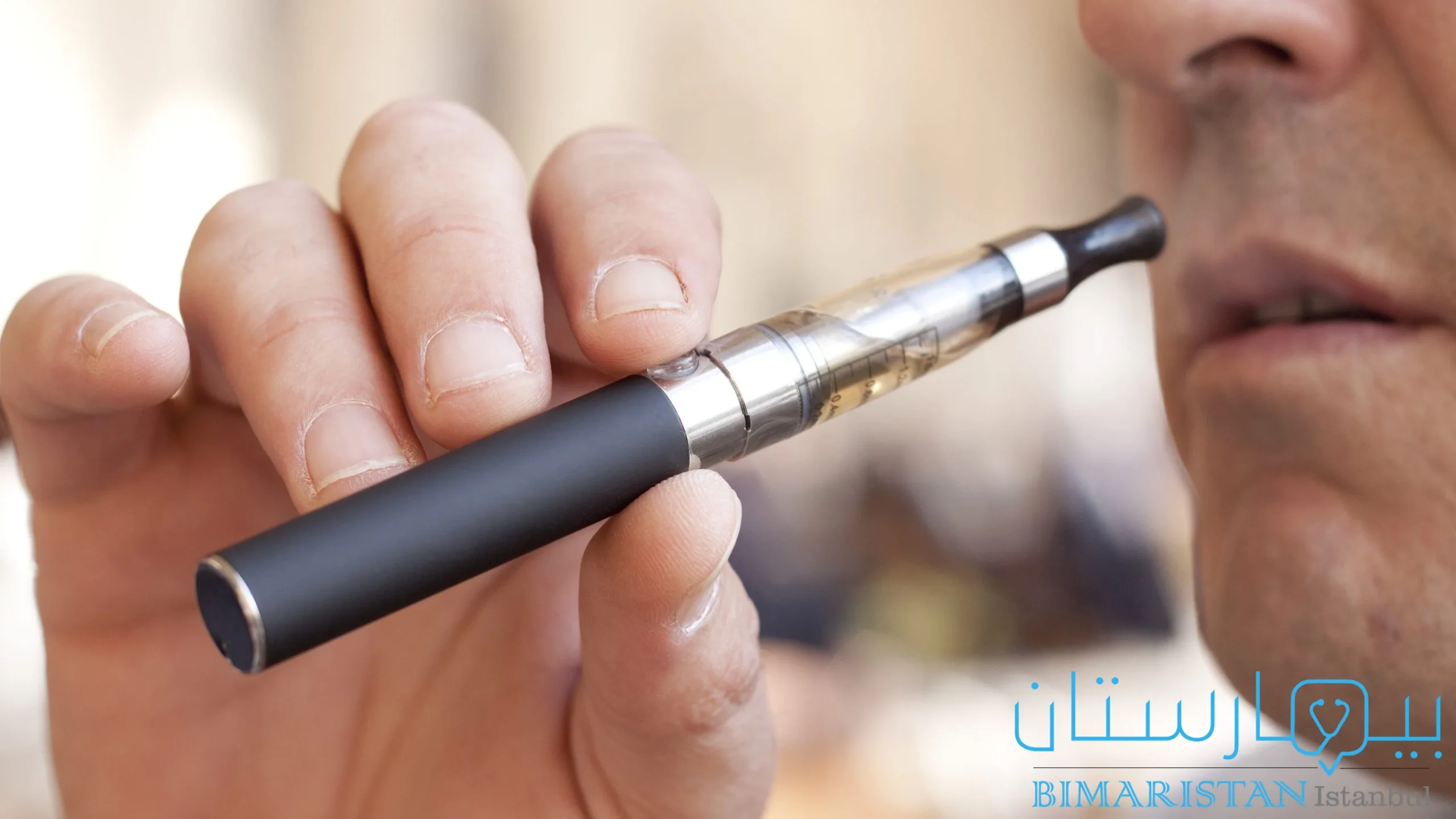 Photo of a man using electronic cigarettes